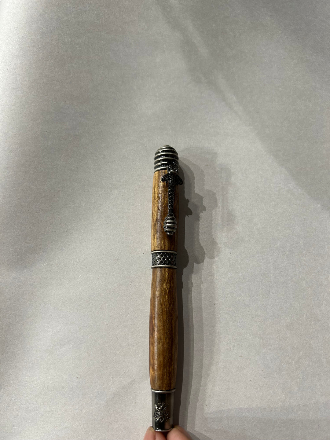 pecan wood hardware  A bee hive medium nib fountain pen with brush nickel metal hardware .And pecan wood.
