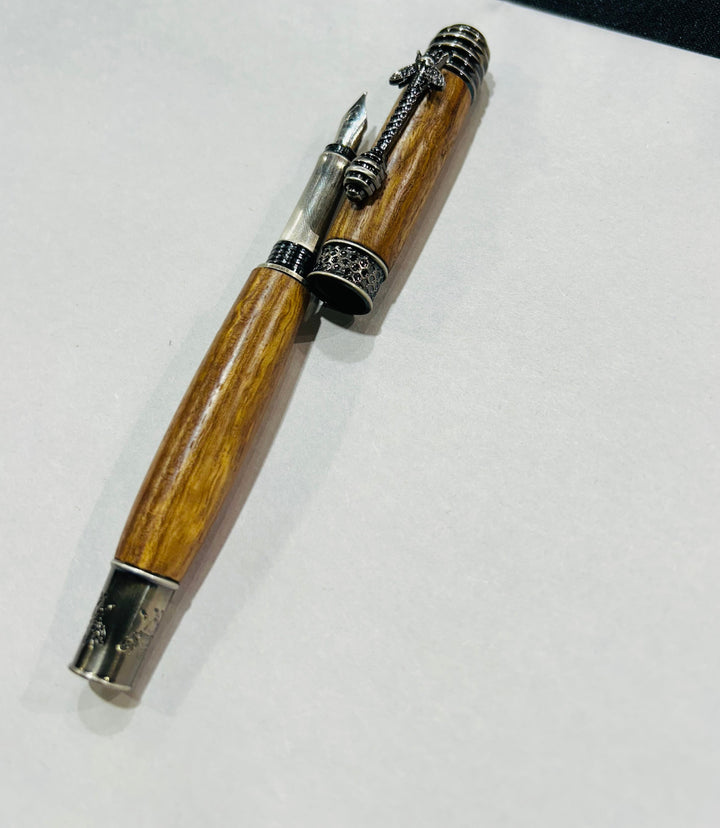 pecan wood hardware  A bee hive medium nib fountain pen with brush nickel metal hardware .And pecan wood.