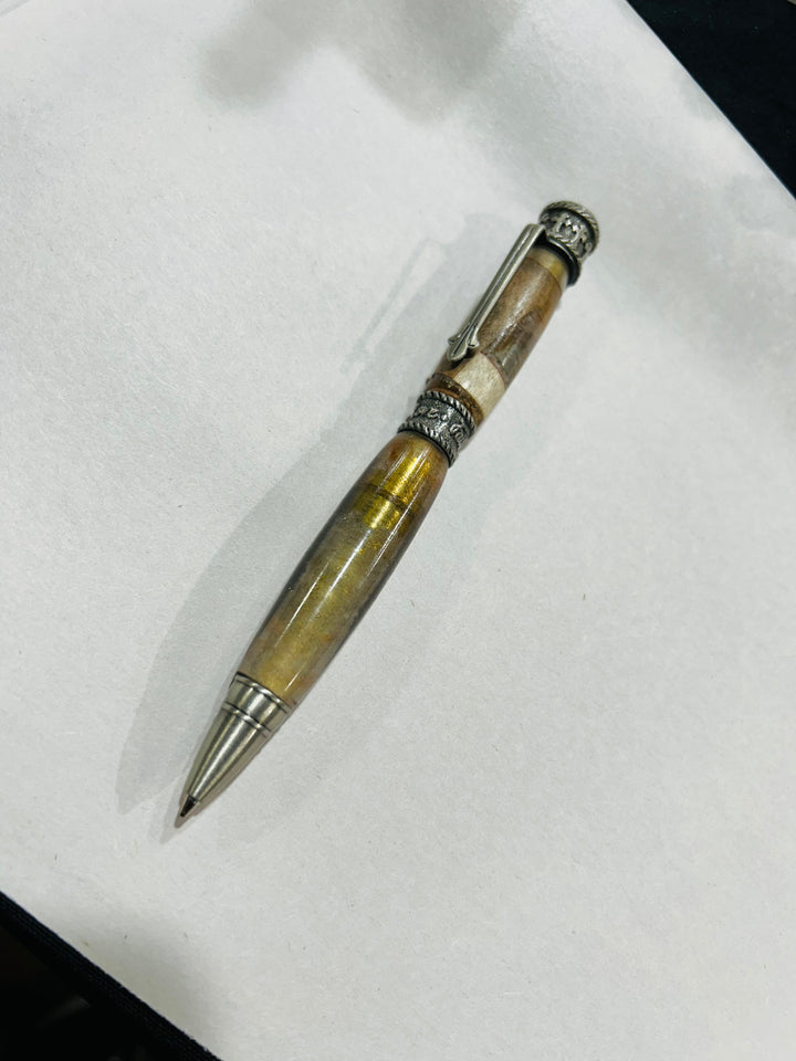 Ball point, pen with a brush nickel metal design, hardware . And acrylic and cherry wood . friction finish.
