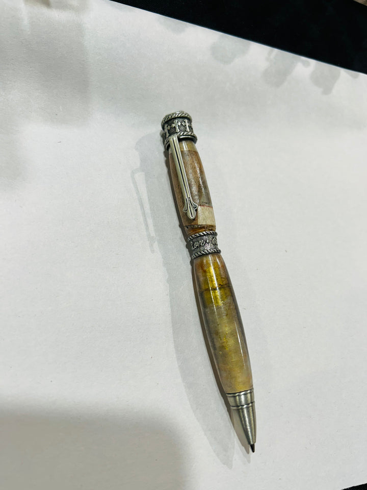 Ball point, pen with a brush nickel metal design, hardware . And acrylic and cherry wood . friction finish.