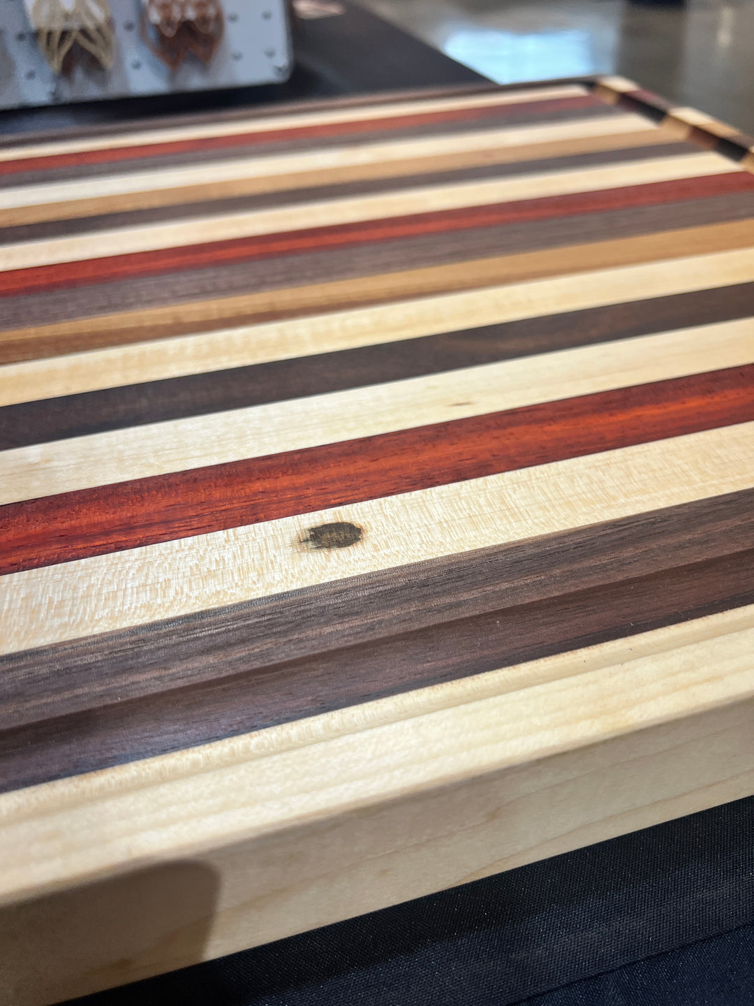 Edge Grain Walnut, Padauk, Maple, and Cherry Cutting Board