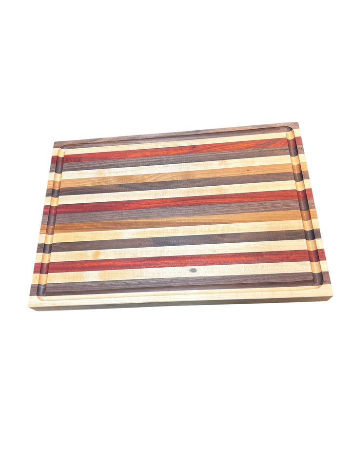 Edge Grain Walnut, Padauk, Maple, and Cherry Cutting Board